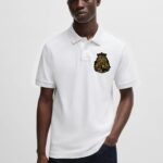 Comverses Mens Gold Royal Crest White Short Sleeves